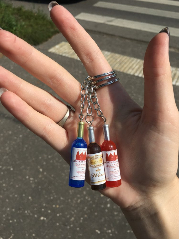 Key chain pendant phone is connected to a mobile phone